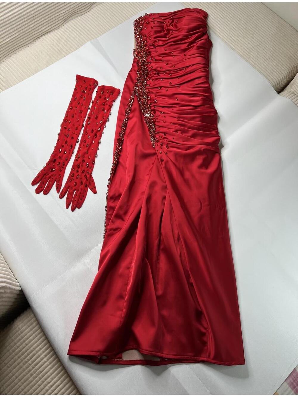 Red Strapless Evening Gown with Beaded Detailing and Matching Gloves